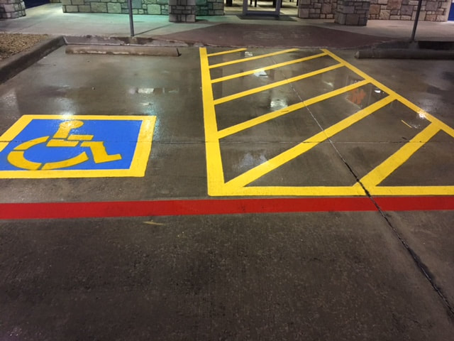 Handicap Stall Stenciling Yellow and Blue