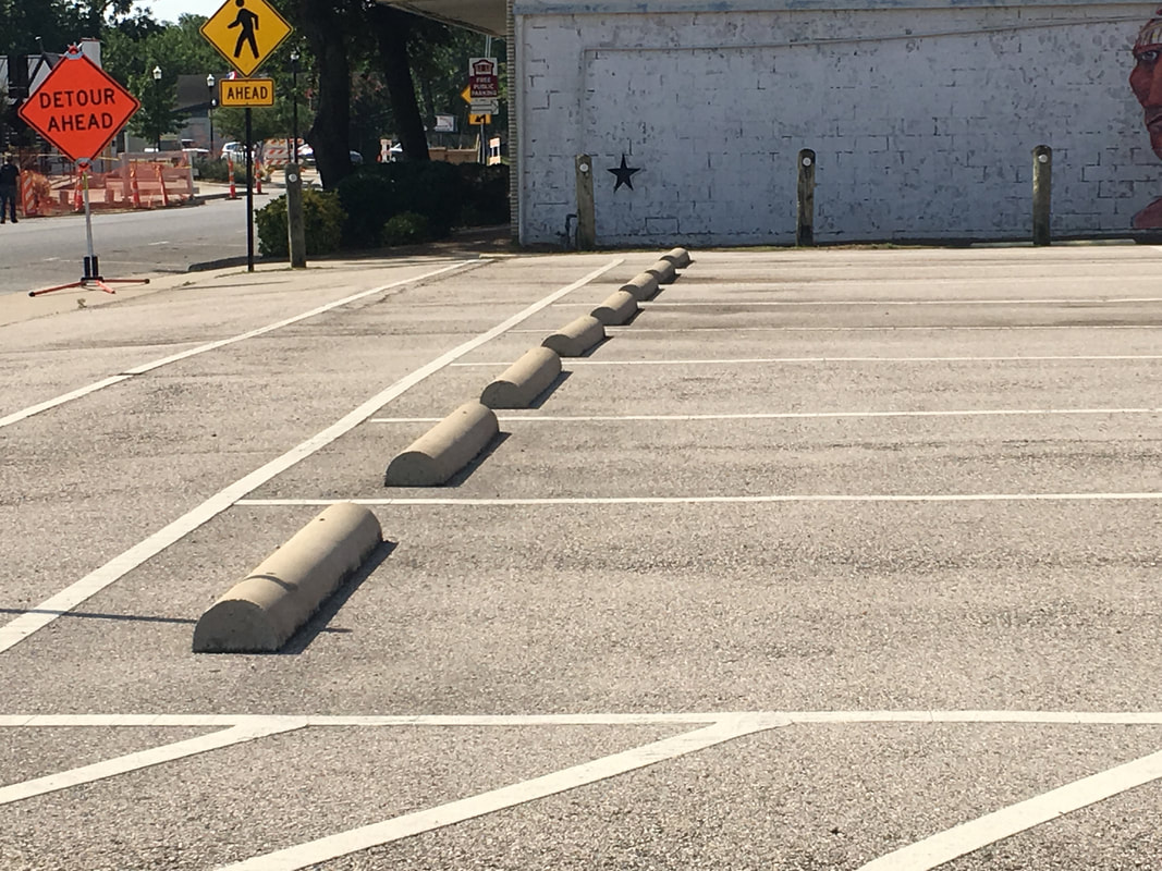 parking-lot-wheel-stops-unpainted
